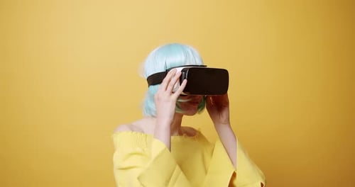 Woman Enjoys Virtual Reality Experience with VR Headset