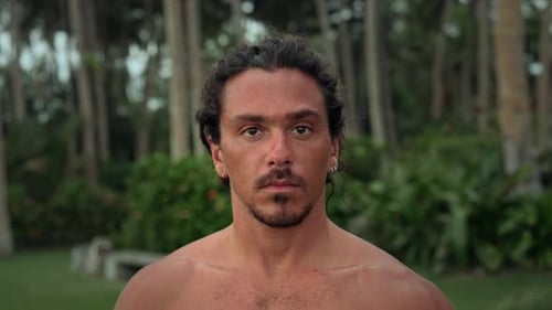 Portrait Of Man Surfer At Island or Person Looking At Camera at Green Nature