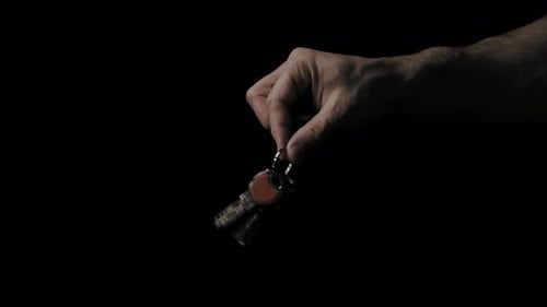 Hand Holding a Key – Symbol of Opportunity or Ownership