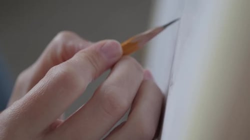 Hand Drawing with Pencil on Paper Close Up