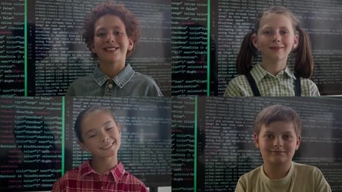 Four smiling children against a background of code