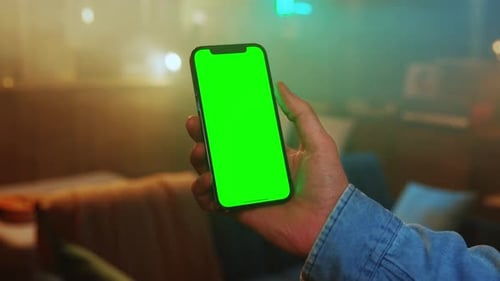 Hands Man Using a Mobile Phone with a Vertical Green Screen Social Media Smartphone Mock Up