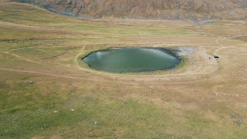aerial view of the little blue lake in mountains