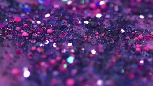 Macro Shot of Pink and Purple Glittering Particles