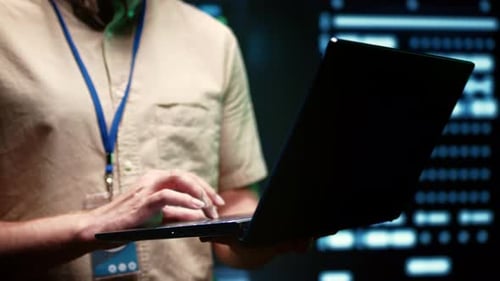 Close Up of Person Typing on Laptop Keyboard