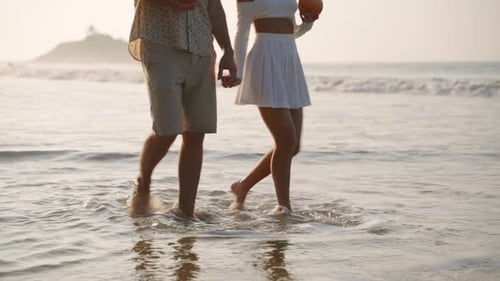 Romantic Man Woman Walking Holding Hands in Sea Surf Nice Couple Going Relaxed Along Ocean Coast at