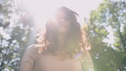 Female Model Shaking Head with Brunette Hair is an Attractive Caucasian Attractive Joyful Happy Sexy