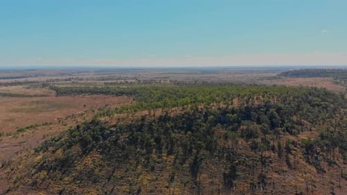Aerial view of rugged mountains and dry landscape, Australia.
