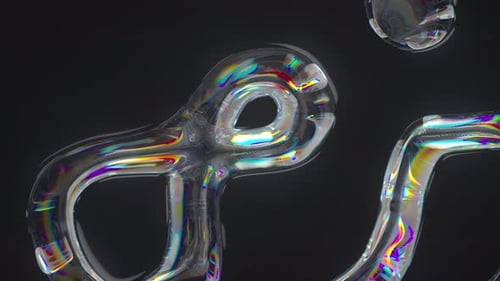 Transparent multicolored liquid waving surface, ripples with iridescent effect.