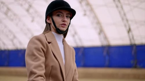 Pretty lady horse riding. Countryside ranch lifestyle.