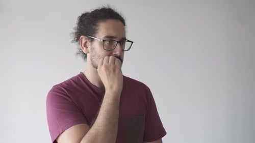 Man Thinking Wearing Glasses Indoors