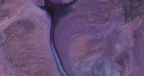 Sparkling Purple Fluid Swirls in Abstract Motion
