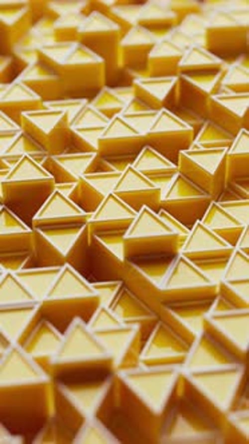 Animación 3D en bucle de pirámides amarillas en un patrón geométrico dinámico.