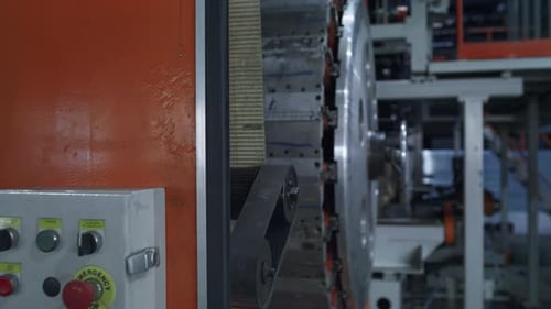 Robotic Tyre Production Equipment Working at Modern Automotive Warehouse Closeup. Industrial Mechani