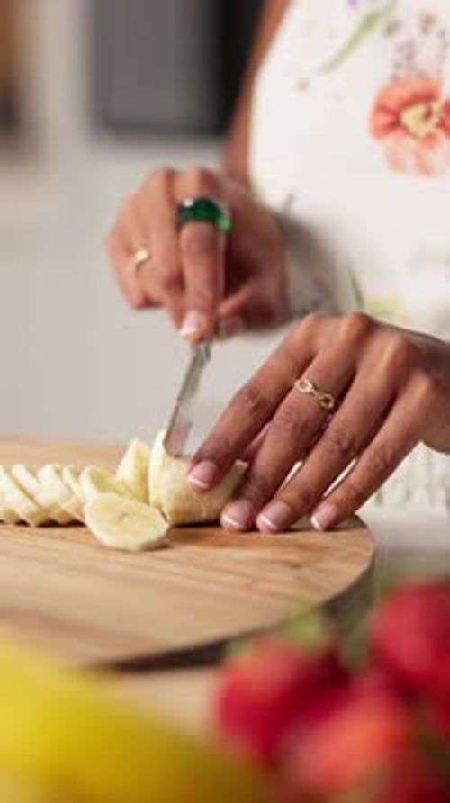 Slicing a Banana in the Kitchen