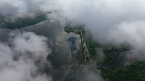 Flying in the clouds. View from the sky on beautiful nature background. White clouds are moving.