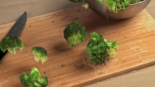 Broccoli Falls on the Board Filmed is Slow Motion 1000 Fps