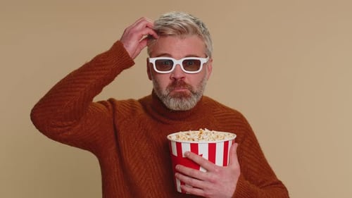 Bearded Man Reacts to 3D Movie with Popcorn