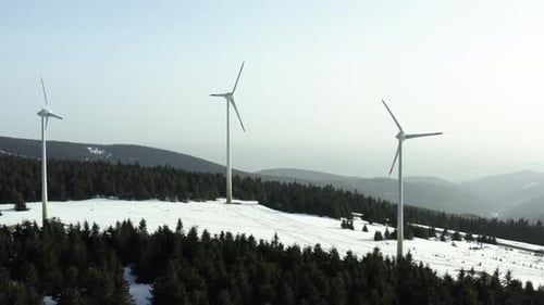 Sustainable energy, windmills creating electricity with wind turbines