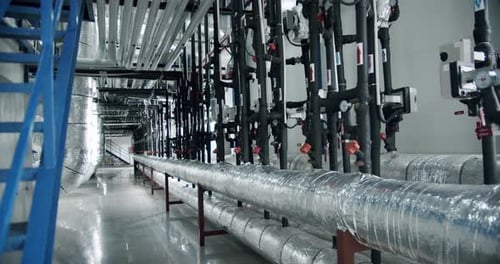 Building with Pipes and Valves in Industrial Setting
