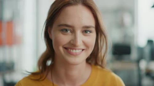 Smiling young woman in an office setting