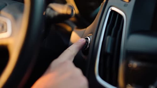 Close-up of Finger Pressing a Start Engine Button. Starting a Car