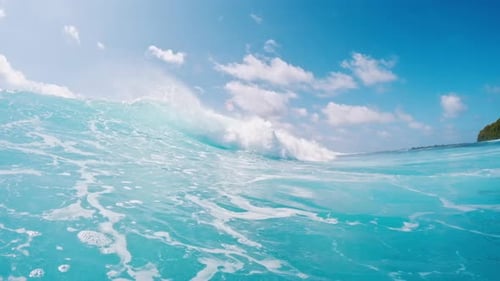 Ocean wave. Crystal clear ocean wave rolls and breaks