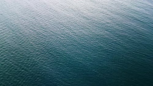 Aerial View of Calm Sea Waters The Surface of the Water Forms a Textured Tranquil Pattern Under