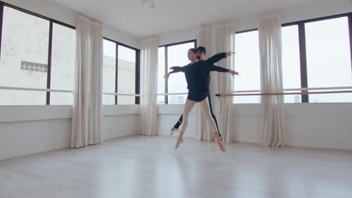 Young Couple Dancing Ballet at the Studio