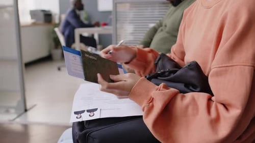 Anonymous Visa Applicant Preparing Documents for Interview