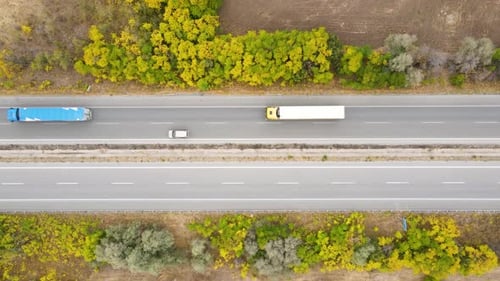 Highway In Autumn Forest