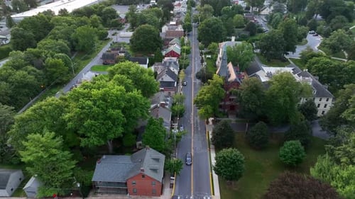 Aerial in Lititz Pennsylvania. Reverse dolly tracking above historic town. Coolest Small Town in Ame