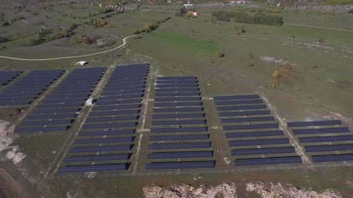Solar Panels Generating Renewable Energy in a Rural Landscape