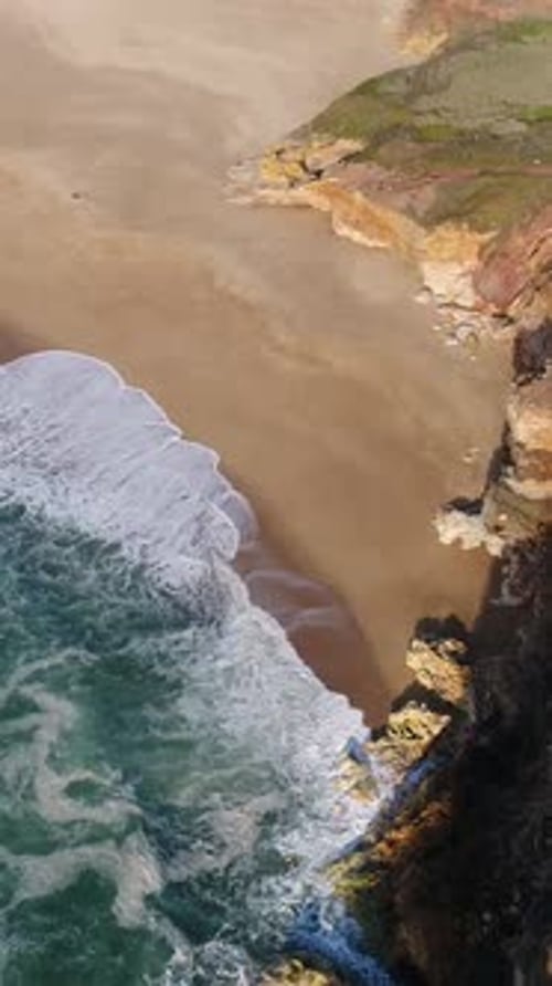 Aerial View of Nazare Coastline in Portugal with Waves Cliffs and Atlantic Ocean 03