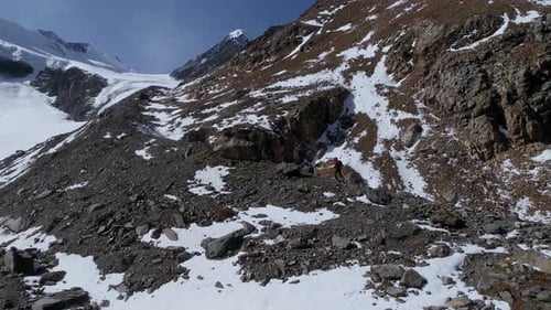 Mountain Hike in Snowy Winter Wilderness
