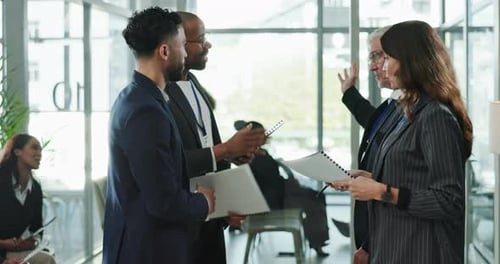 Professionals Collaborating in a Bright, Modern Office