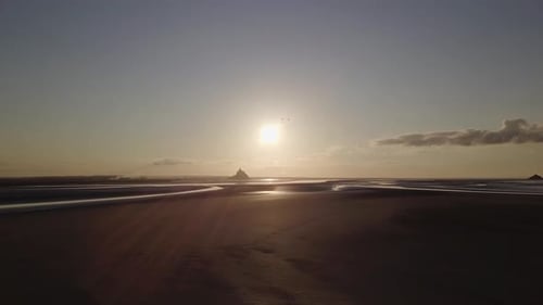 Mont Saint Michel abbey medieval castle in Normandy Bretagne France. Gothic island fortification sun