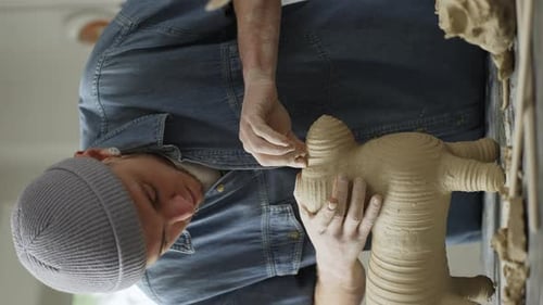 Young Adult Sculpting Clay Art Indoors