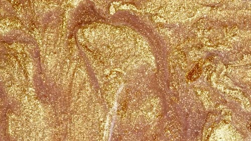 Glittering Gold and Brown Fluid Texture