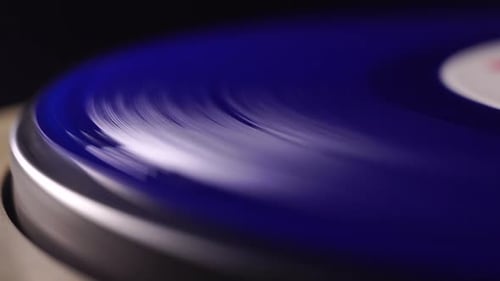 Close Up, Blue Vinyl Record Spinning on Gramophone Turntable