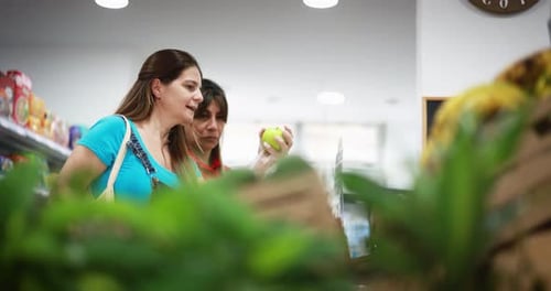 Female Customer Buying Organic Food Fruits Inside Eco Fresh Market - Shopping
