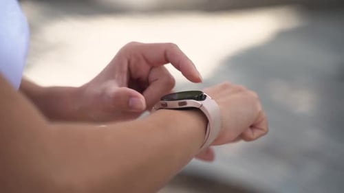 Close Up Jogging Woman Hands Using Smart Watch After Before Running Sport Activity Mob App Tracker