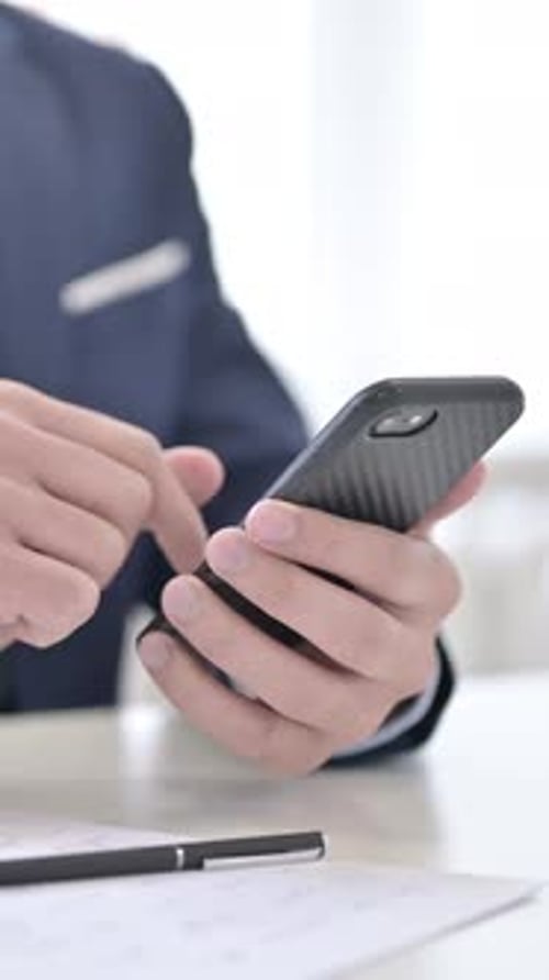 Close Up, Businessman Using Smartphone, vertical video