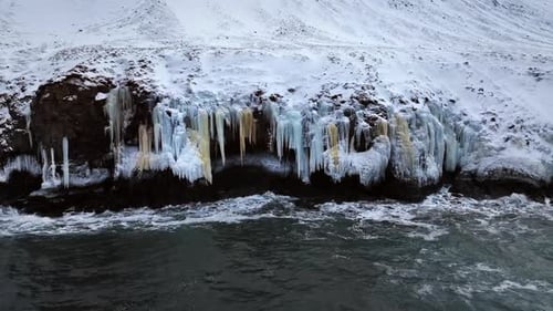 Icy Seascape in Winter: Coastline Aerial View