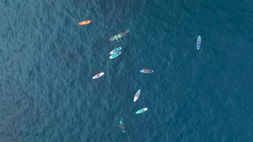 Aerial View Paddleboarding in a Beautiful Mediterranean Lagoon With Calm Waters