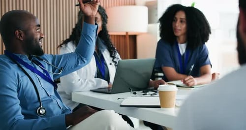 Man, doctors and team at office meeting with discussion, documents or happy with feedback at clinic
