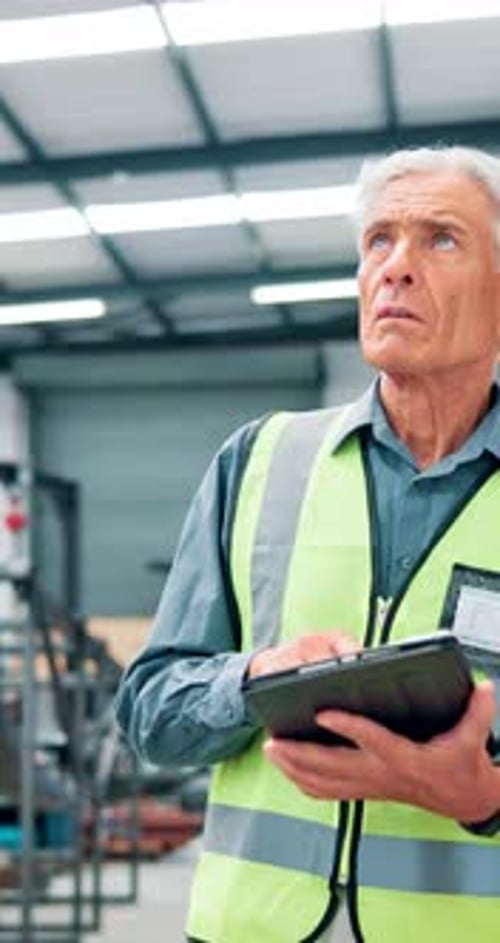 Mature man, engineer and tablet at warehouse for machine inspection with checklist for safety