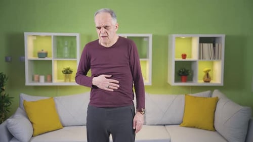 The old man is struggling with the disease. Cancer patient.