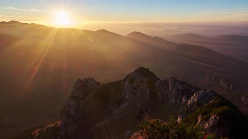Timelapse Golden Sunset Over Sharp Rocky Mountains in a Beautiful Autumn Landscape