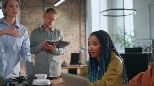 Business Team Brainstorming and Sharing Ideas